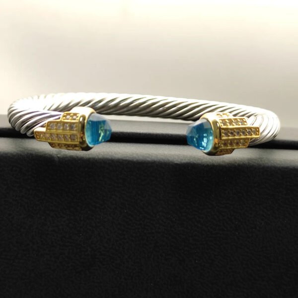 9E3CB93B-D5BD-FFD0-A3E6-7FFC2196B074.jpg 7mm Cable Bracelet with Aquamarine & Diamond Accents ??Gold Cap